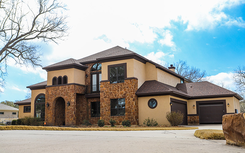 dark shingles on a central texas home with spanish influence and style